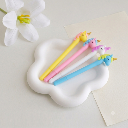 4 stylos kawaii licorne 3D en silicone pastel : jaune, rose, blanc et bleu avec corne dorée